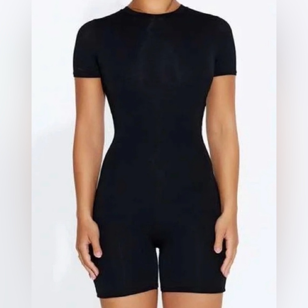 NWOT Naked Wardrobe The Bae-Sic Crew Romper in Black Size 1X